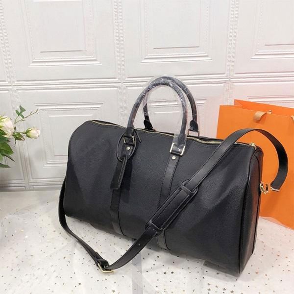 fashion handbags large capacity brand women travel bags pu leather good quality designer men shoulder duffel bag on luggage bottom rivets wi
fashion handbags large capacity brand women travel bags pu leather good quality designer men shoulder duffel bag on luggage bottom rivets wi