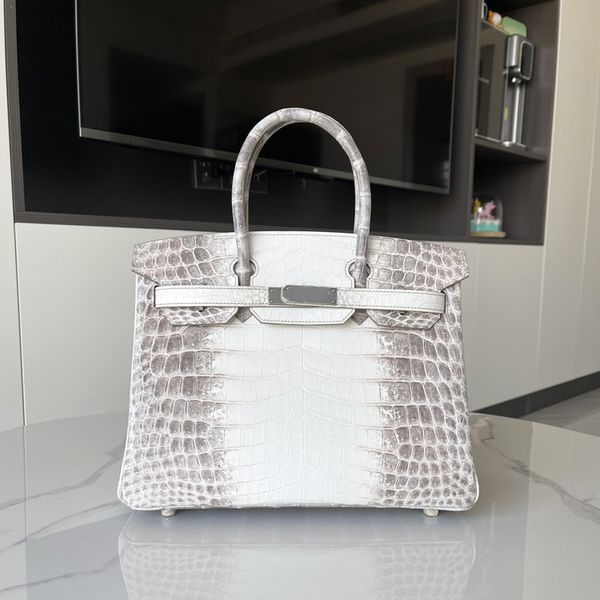 2023 women's handbag crocodile cowhide handbag fully handmade wax thread sewn luxury designer classic fashion women's perforated s
2023 women's handbag crocodile cowhide handbag fully handmade wax thread sewn luxury designer classic fashion women's perforated s