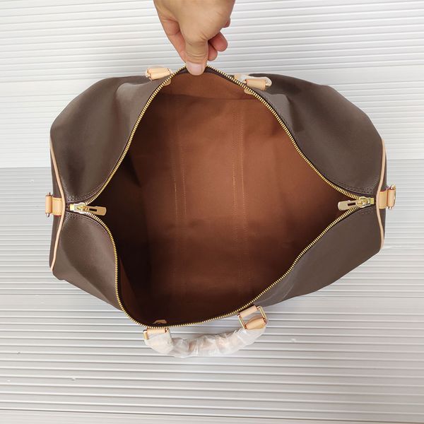 55cm handbags large capacity womens travel bags genuine leather designer mens shoulder duffel bag on luggage bottom rivets with lock head
55cm handbags large capacity womens travel bags genuine leather designer mens shoulder duffel bag on luggage bottom rivets with lock head