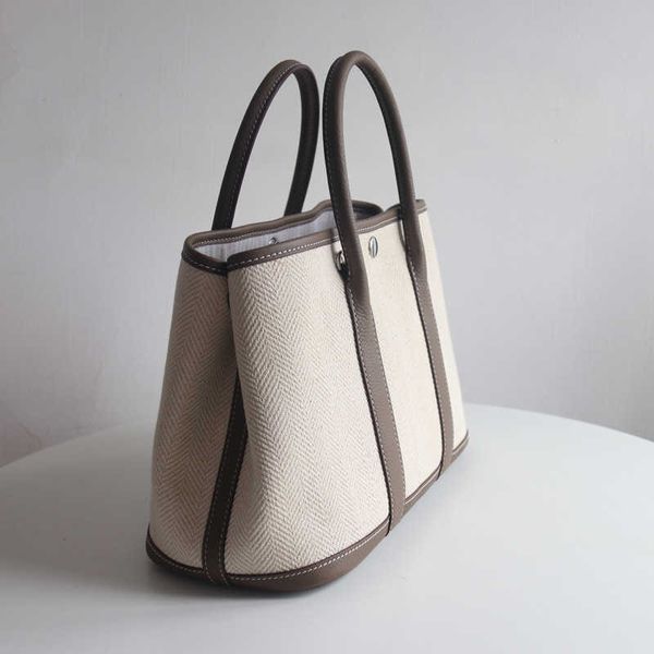 factory wholesale designer h ormes totes handbags color contrast tote shopping bag garden 30cm large capacity light canvas with cowhide for
factory wholesale designer h ormes totes handbags color contrast tote shopping bag garden 30cm large capacity light canvas with cowhide for