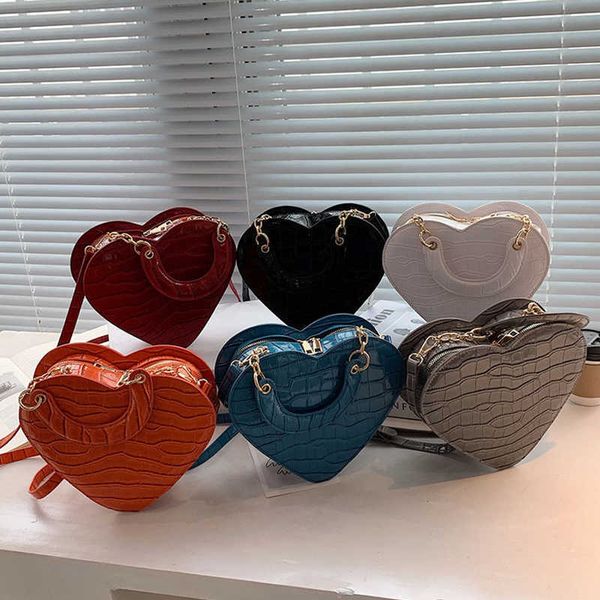 fashion brand heart tote bag for women 2023 new trend pu leather crossbody bags female small shoulder cute purse handbags 230209
fashion brand heart tote bag for women 2023 new trend pu leather crossbody bags female small shoulder cute purse handbags 230209