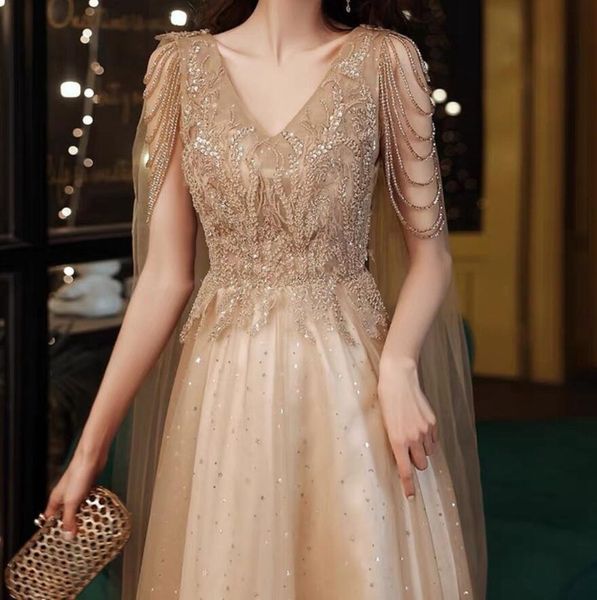 party dresses champagne gold evening with cape a line vneck aline shiny luxury beading shawl formal celebrity prom gowns 230208, White;black
party dresses champagne gold evening with cape a line vneck aline shiny luxury beading shawl formal celebrity prom gowns 230208, White;black