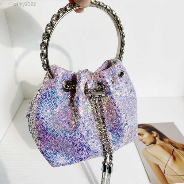 metallic sequin barrel handbag shiny tassels with metal leaf handle and detachable chain strap
metallic sequin barrel handbag shiny tassels with metal leaf handle and detachable chain strap