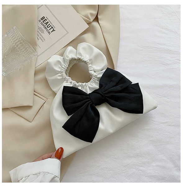 bowknot fold vacation purses soft pu leather handbags evening party female pleated handle bags ladies solid color clutch bag
bowknot fold vacation purses soft pu leather handbags evening party female pleated handle bags ladies solid color clutch bag