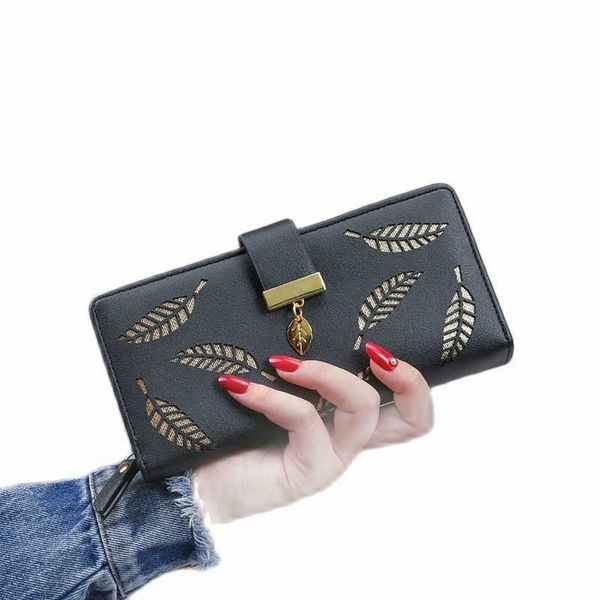 fashion hollow leaf women's handbag casual pu leather bag solid color zipper handbag female card bag lady clutch
fashion hollow leaf women's handbag casual pu leather bag solid color zipper handbag female card bag lady clutch