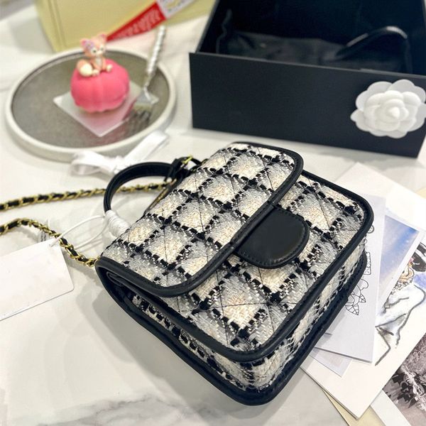 designers lux cotton wool tweed small flap bag milky white cotton tofu bag with a black handle
designers lux cotton wool tweed small flap bag milky white cotton tofu bag with a black handle