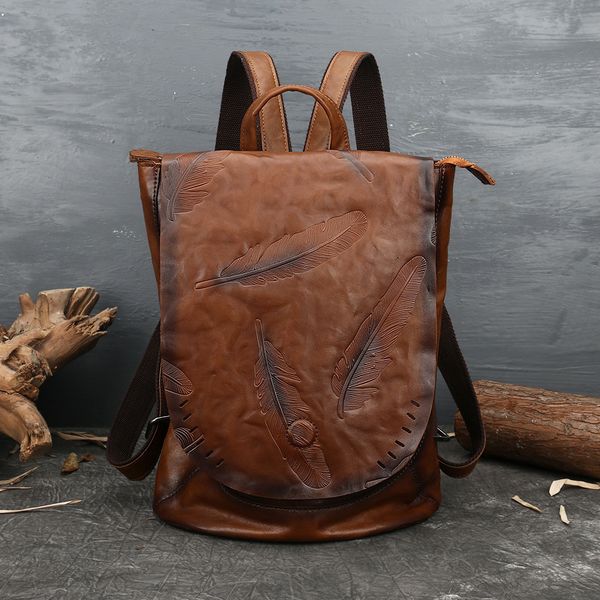 school bags 2023 leather women's bag retro embossed shoulder with cowhide large travel backpack women 230210
school bags 2023 leather women's bag retro embossed shoulder with cowhide large travel backpack women 230210