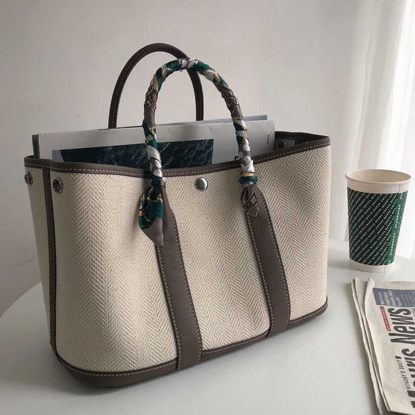 herme garden party bags online store2023 new canvas with layer cowhide women's bag garden hand leather contrast single shoulder messeng
herme garden party bags online store2023 new canvas with layer cowhide women's bag garden hand leather contrast single shoulder messeng