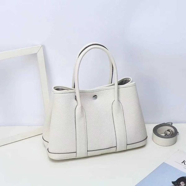 herme garden party bags online store2023 new texture leather large capacity portable bucket one shoulder crossbody tote commuter women'
herme garden party bags online store2023 new texture leather large capacity portable bucket one shoulder crossbody tote commuter women'