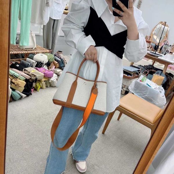 herme garden party handbags price korean large capacity canvas garden with contrast leather carrying shoulder
herme garden party handbags price korean large capacity canvas garden with contrast leather carrying shoulder