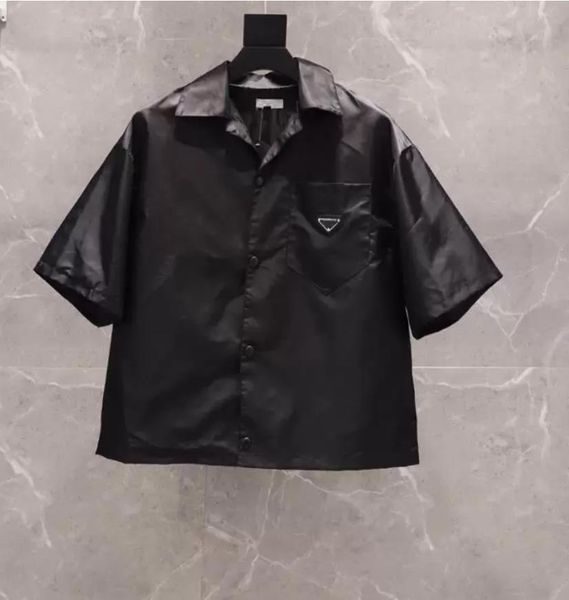 2023 womens and mens shirt casual brand short blouses classic inverted triangle loose imported high-quality nylon tooling summer, White;black
2023 womens and mens shirt casual brand short blouses classic inverted triangle loose imported high-quality nylon tooling summer, White;black