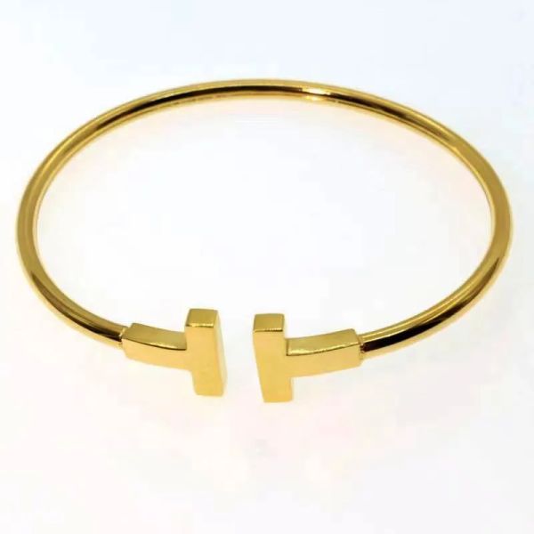 designer 18k gold bracelet double t shaped diamond highly polished c-shaped fashion white shell open bracelet coil ladies bracelet., Black
designer 18k gold bracelet double t shaped diamond highly polished c-shaped fashion white shell open bracelet coil ladies bracelet., Black