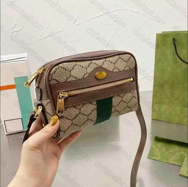 mini ophidia shoulder bag brown monograms web camera-style crossbody bag front zipper pocket with the signature green and red web stripe des
mini ophidia shoulder bag brown monograms web camera-style crossbody bag front zipper pocket with the signature green and red web stripe des