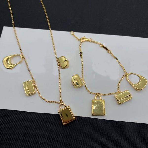 18k gold fashion bag necklace and bracelet. fashion brand classic luxury necklace bracelet jewelry designer for women. wedding party bridal, Silver
18k gold fashion bag necklace and bracelet. fashion brand classic luxury necklace bracelet jewelry designer for women. wedding party bridal, Silver