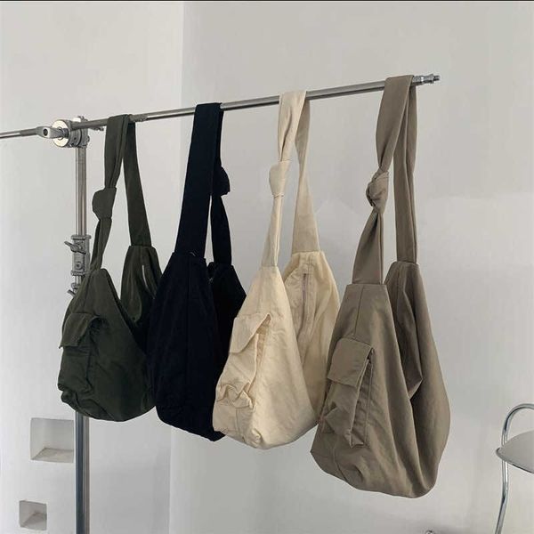 shoulder bags nylon new fashion women's handbag 2022 large capacity shoulder bag with side pocket waterproof fabric hobos strap knotted
shoulder bags nylon new fashion women's handbag 2022 large capacity shoulder bag with side pocket waterproof fabric hobos strap knotted