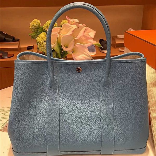 7a h designer garden party bags for women 2023 new fashion leather tote large capacity shopping bucket one
7a h designer garden party bags for women 2023 new fashion leather tote large capacity shopping bucket one