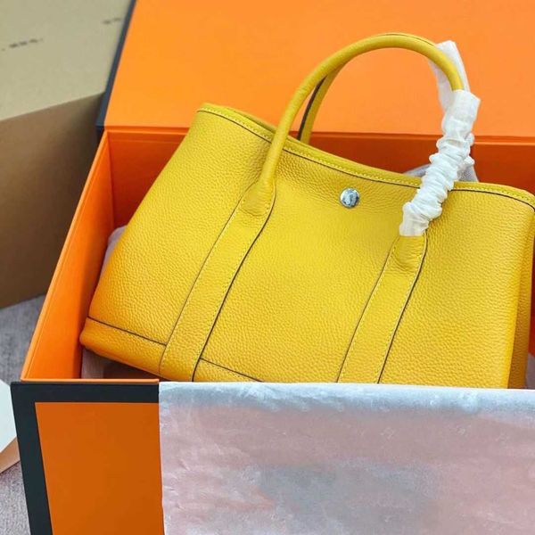 7a h designer garden party bags for women all manual wax line garden bag togo cowhide business hand commut
7a h designer garden party bags for women all manual wax line garden bag togo cowhide business hand commut