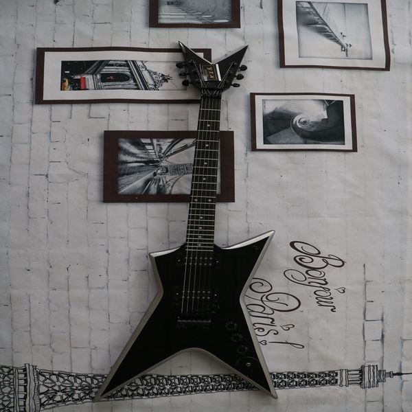 high-quality electric guitar with white rim and black fork, high-end pickup, and delivery
high-quality electric guitar with white rim and black fork, high-end pickup, and delivery