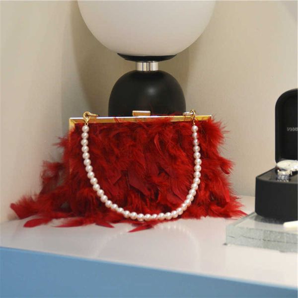 luxury turkey feather handbag women's evening clutch bag with pearl chain shoulder women s design party purse
luxury turkey feather handbag women's evening clutch bag with pearl chain shoulder women s design party purse