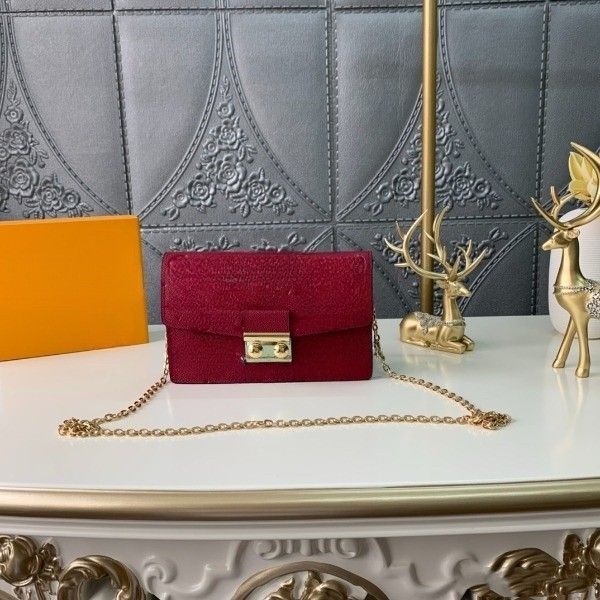 clutch bag one shoulder bag or crossbody bag full leather embossed chain money clip stitching canvas and calfskin with floral shape clasp
clutch bag one shoulder bag or crossbody bag full leather embossed chain money clip stitching canvas and calfskin with floral shape clasp