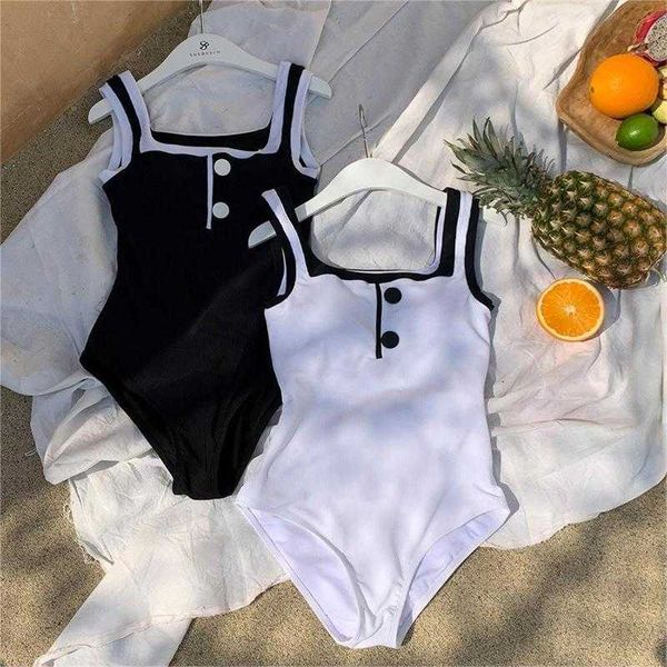 classic style simple jumpsuit suspender swimsuit button design slimming, White;black
classic style simple jumpsuit suspender swimsuit button design slimming, White;black