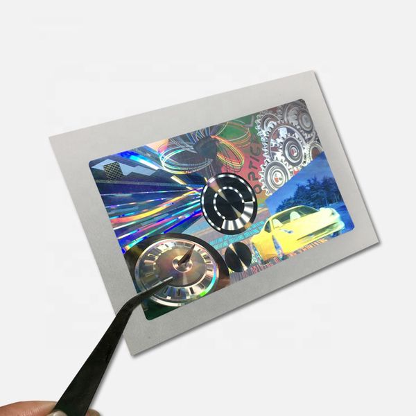 84*52mm custom glossy laminated laser engraving hologram master shim label with different holographic lens pattern
84*52mm custom glossy laminated laser engraving hologram master shim label with different holographic lens pattern