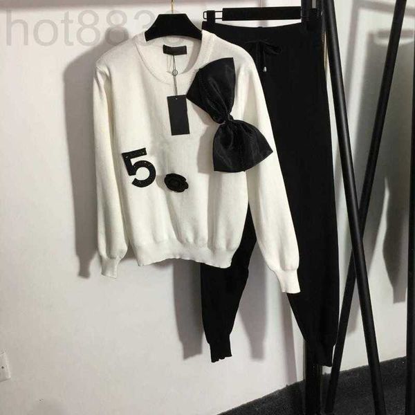 women's two piece pants designer knitted suit with nail drill letter bowknot round collar long sleeve knit sweater elastic waist casual, White
women's two piece pants designer knitted suit with nail drill letter bowknot round collar long sleeve knit sweater elastic waist casual, White