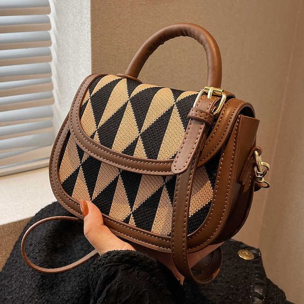 totes this year's popular small bag women's new fashion autumn and winter messenger design portable saddle
totes this year's popular small bag women's new fashion autumn and winter messenger design portable saddle