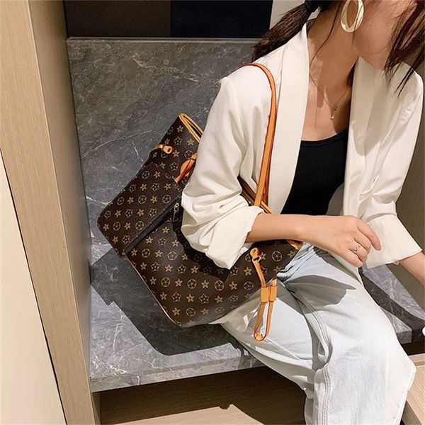 2023 women handbag brown flower tote bags shoulder crossbody purse fashion genuine leather large capacity classic letter clutch purses
2023 women handbag brown flower tote bags shoulder crossbody purse fashion genuine leather large capacity classic letter clutch purses