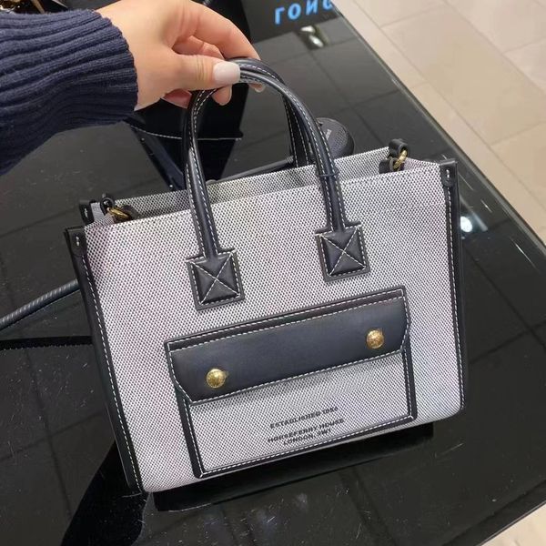 burbrery quality designer high shopping bag luxury beach bagswomen handbags woody tote handbag wholesale canvas fashion large travel crossbo
burbrery quality designer high shopping bag luxury beach bagswomen handbags woody tote handbag wholesale canvas fashion large travel crossbo