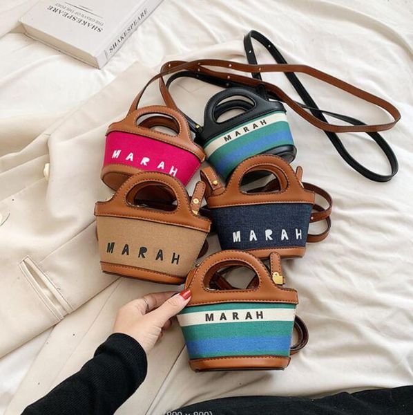 5-color children's new letter girls' handbag high sense women's cross-body bag mouth red bag, Black
5-color children's new letter girls' handbag high sense women's cross-body bag mouth red bag, Black