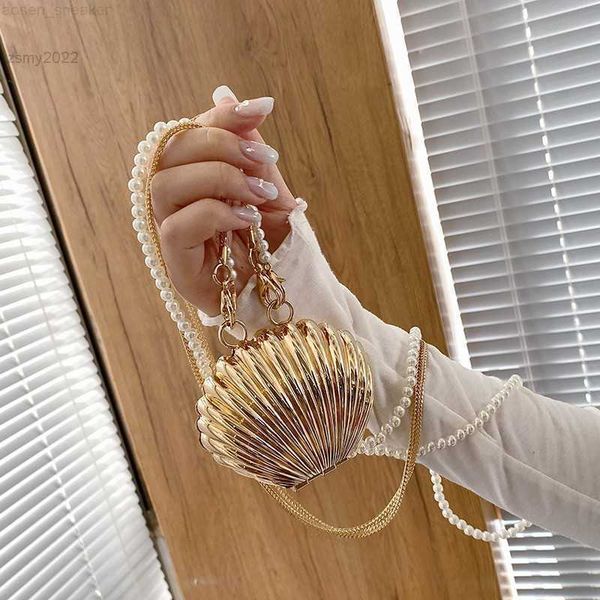 metallic mini shell bag pearls chains shoulder crossbody bag luxury small lipstick coins purses women's designer handbags 2022
metallic mini shell bag pearls chains shoulder crossbody bag luxury small lipstick coins purses women's designer handbags 2022