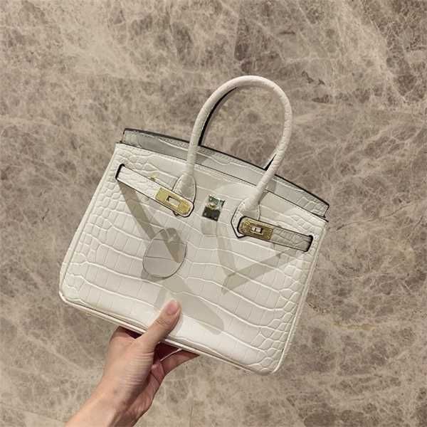 herme birkins women bags yuanbao bag crocodile pattern leather premium sense new fashion female sakura pollen handbag
herme birkins women bags yuanbao bag crocodile pattern leather premium sense new fashion female sakura pollen handbag