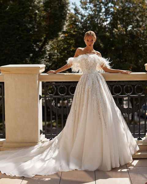 elegant a-line luxury wedding dresses sleeveless feather bateau neck beaded sequins appliques diamonds sparkly bridal gowns plus size vestid, White
elegant a-line luxury wedding dresses sleeveless feather bateau neck beaded sequins appliques diamonds sparkly bridal gowns plus size vestid, White