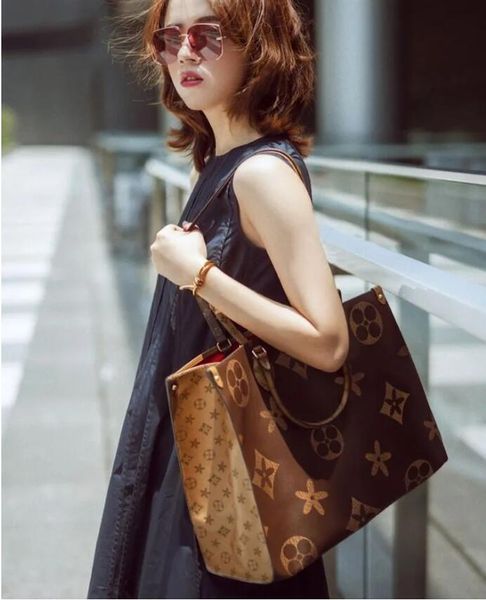 classic luxury totes designer bag womens handbags onthego tote bag crossbody flower ladies casual pvc leather purse shoulder bags female lar
classic luxury totes designer bag womens handbags onthego tote bag crossbody flower ladies casual pvc leather purse shoulder bags female lar