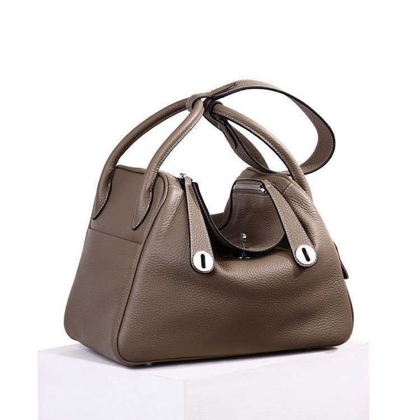 designer herme lindi bags online outlet fashion women's bag pillow new medicine box head layer cow leather shoulder hand
designer herme lindi bags online outlet fashion women's bag pillow new medicine box head layer cow leather shoulder hand