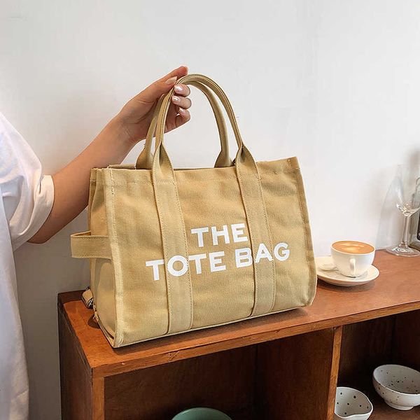 23s 2022 luxury designer the tote bag for women large capacity canvas handbags female shoulder messenger s sac
23s 2022 luxury designer the tote bag for women large capacity canvas handbags female shoulder messenger s sac