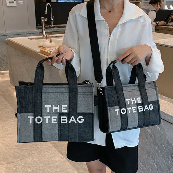 23s the tote bag luxury women's handbag brand retro national style letter large capacity black blue fashion woman long shoulder
23s the tote bag luxury women's handbag brand retro national style letter large capacity black blue fashion woman long shoulder