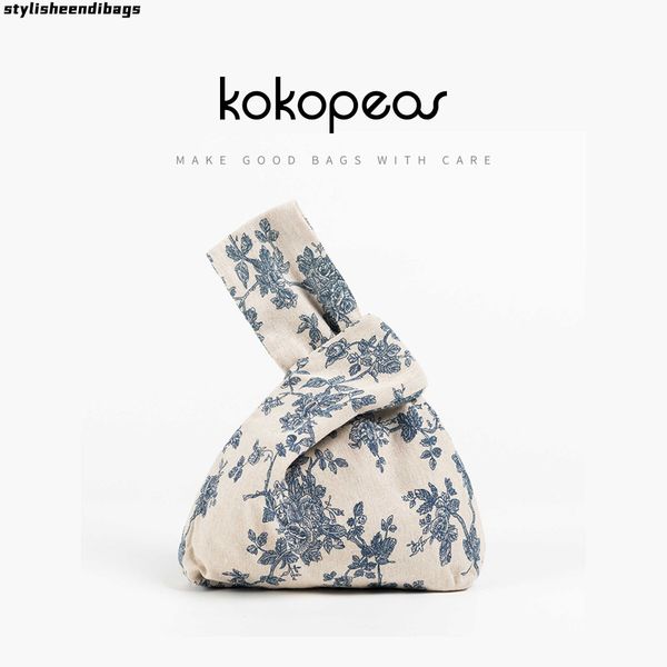 totes kokopea japanese mini portable knot wrist bag women handle bag simple purse handbags waterproof shopping bag phone key pouch 0216/23
totes kokopea japanese mini portable knot wrist bag women handle bag simple purse handbags waterproof shopping bag phone key pouch 0216/23
