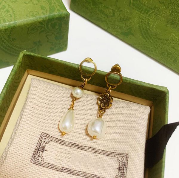 chic double letter charm stud earrings fashion brand have stamp studs pearl eardrop dangler for women party anniversary, Golden;silver
chic double letter charm stud earrings fashion brand have stamp studs pearl eardrop dangler for women party anniversary, Golden;silver