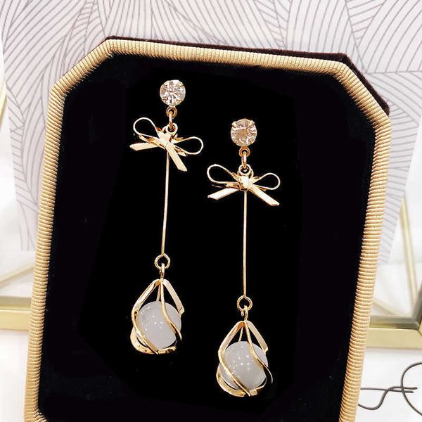 korean temperament versatile 925 silver needle earrings long bow opal earrings net red personalized, Golden
korean temperament versatile 925 silver needle earrings long bow opal earrings net red personalized, Golden