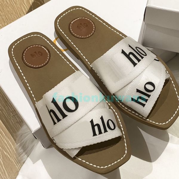 paris slippers luxury loe women flat shoes white blue black designer lady round toes outdoor beach sandals size 34-42
paris slippers luxury loe women flat shoes white blue black designer lady round toes outdoor beach sandals size 34-42