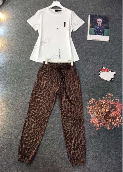 tracksuits two piece pants letters print short sleeve casual cotton t-shirt striped embellish elastic waist sports style trousers two pieces, White
tracksuits two piece pants letters print short sleeve casual cotton t-shirt striped embellish elastic waist sports style trousers two pieces, White