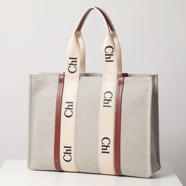 luxurys designers large capacity woody tote bags 3size womens mens clutch beach shopper shoulder canvas bag purse and handbag fashion crossb
luxurys designers large capacity woody tote bags 3size womens mens clutch beach shopper shoulder canvas bag purse and handbag fashion crossb