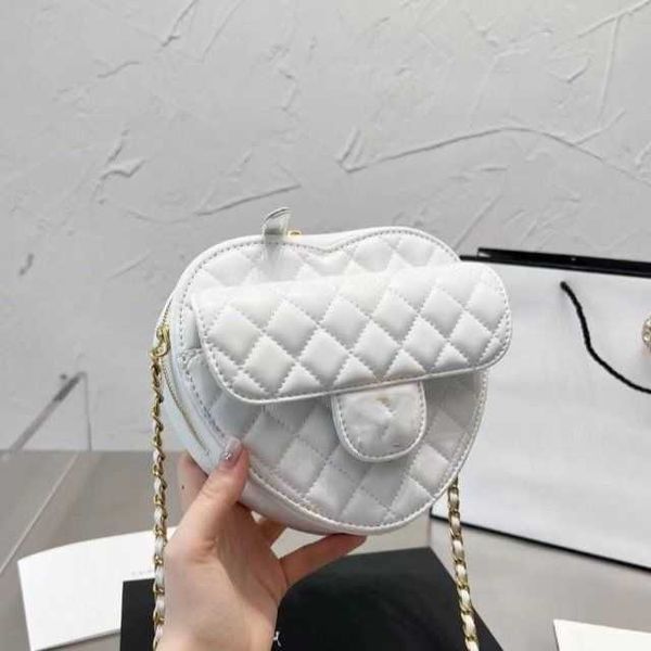 designer channel bagspring and summer product small fragrant wind diamond check women's bag love bag peach heart bags shoulder messenge
designer channel bagspring and summer product small fragrant wind diamond check women's bag love bag peach heart bags shoulder messenge