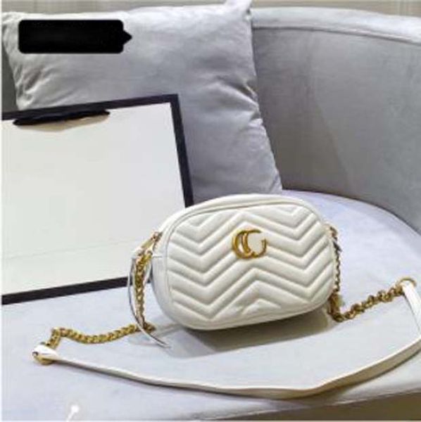 the classic design of the shoulder bag is quilted mini shoulder bag quilted fabric leather with ancient gold color accessories
the classic design of the shoulder bag is quilted mini shoulder bag quilted fabric leather with ancient gold color accessories