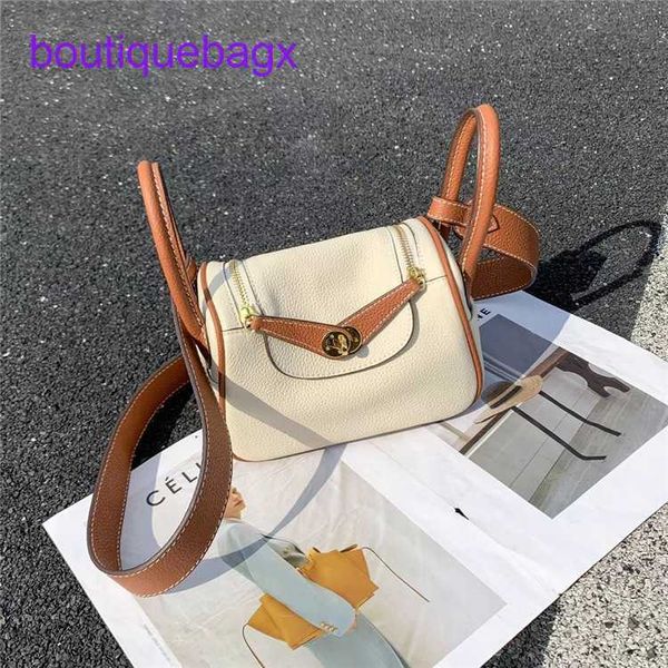 designer lindi bags hremm 2023 new mini bag togo pattern head leather color contrast medicine box one shoulder messenger bag fashion style
designer lindi bags hremm 2023 new mini bag togo pattern head leather color contrast medicine box one shoulder messenger bag fashion style