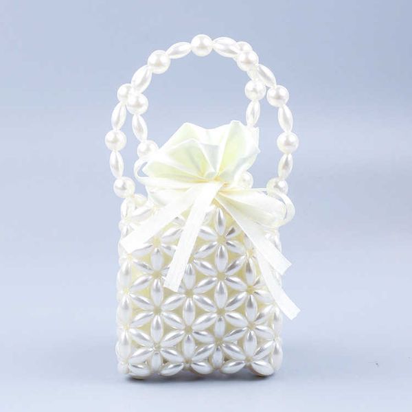 net red women's bag new simple oval pearl handbag texture western-style hollow woven women's handbag 230220
net red women's bag new simple oval pearl handbag texture western-style hollow woven women's handbag 230220