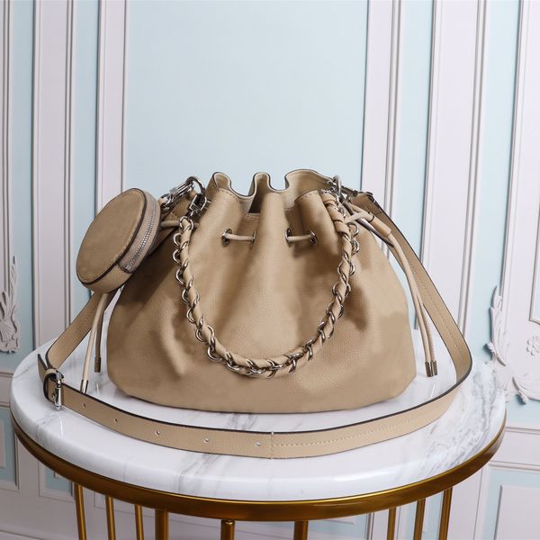 7a designer women's totes perforated cowhide muria bag lightweight handbag hollow out leather
7a designer women's totes perforated cowhide muria bag lightweight handbag hollow out leather