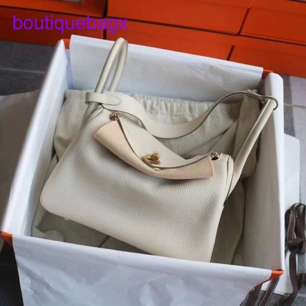 h ermes designer tote bags lindi bags 2023 new leather women s bag layer cowhide gold button doctor single shoulder portable medicin with re
h ermes designer tote bags lindi bags 2023 new leather women s bag layer cowhide gold button doctor single shoulder portable medicin with re